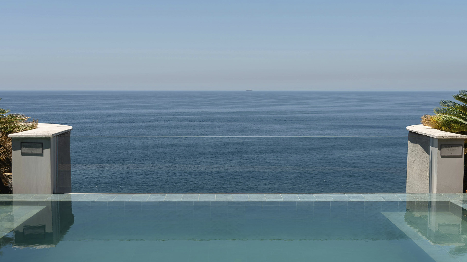 Infinity pool at a beachfront condo with Sea of Cortez view