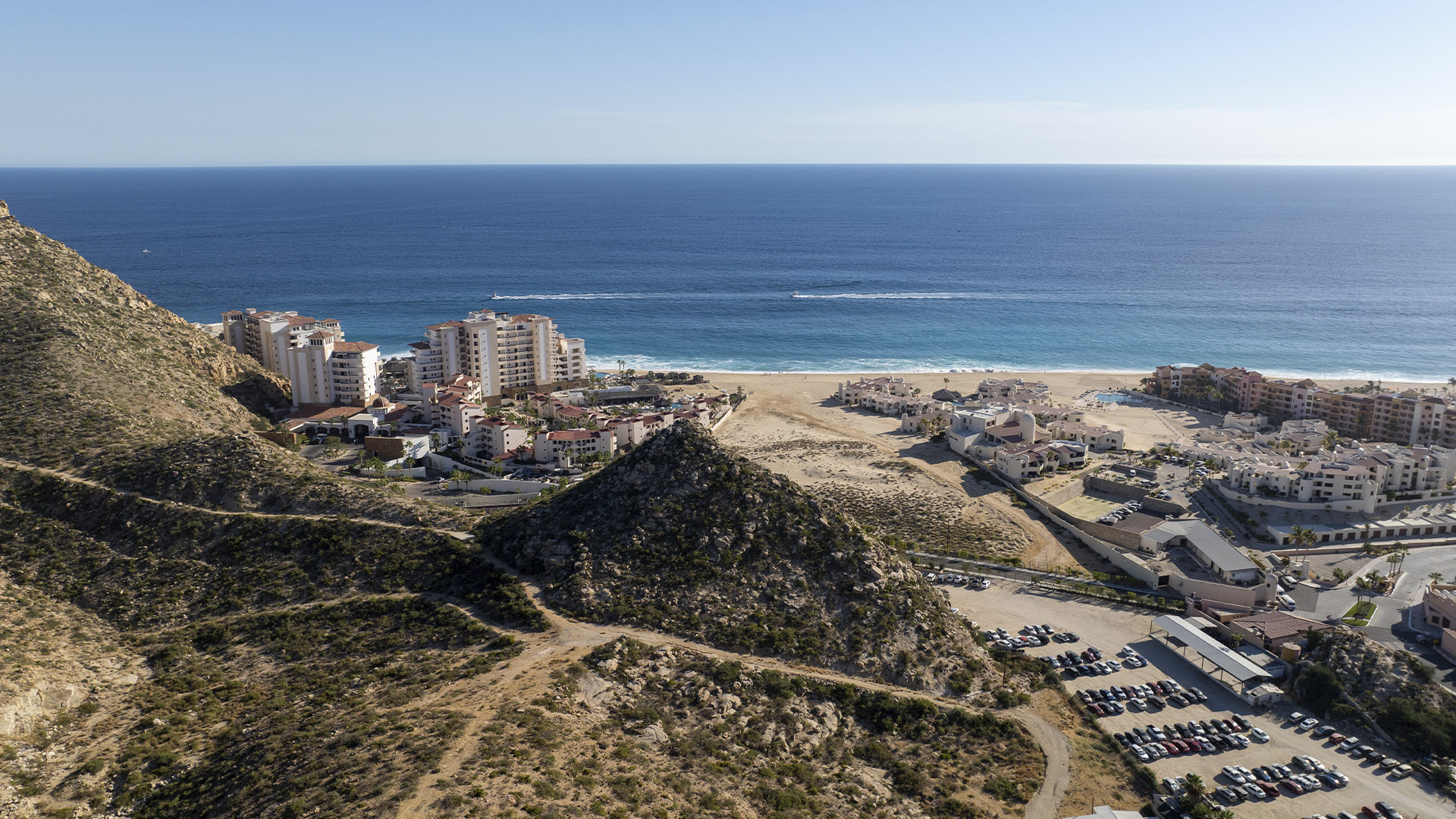 Aerial of Los Cabos coastline with condo communities and beaches