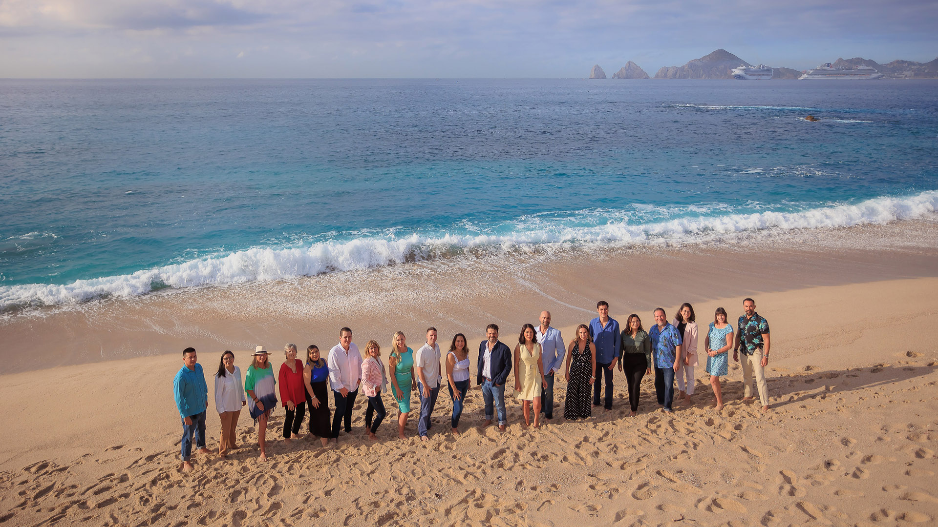 Professional real estate agents in Los Cabos discussing luxury property