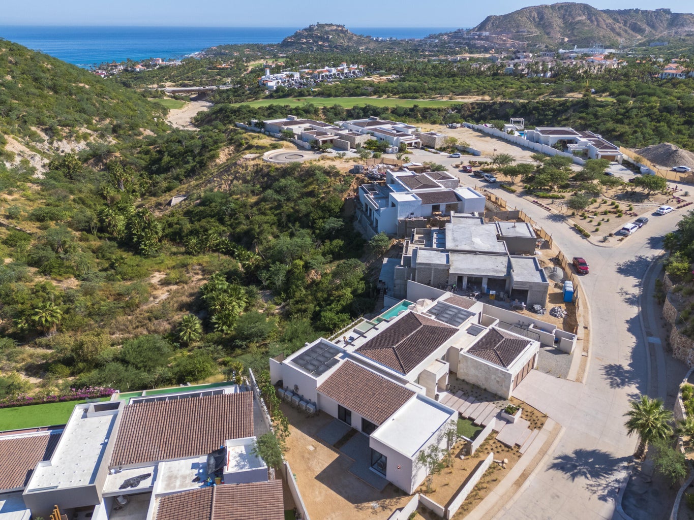 Aerial view of luxury homes for sale in Horizontes, San José del Cabo and desert landscape