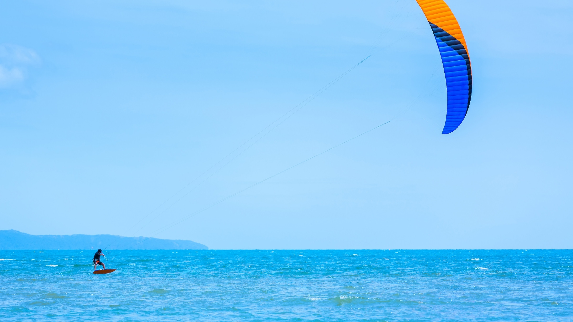 Downtown Los Barriles, colorful buildings and kiteboarders along the Baja coastline